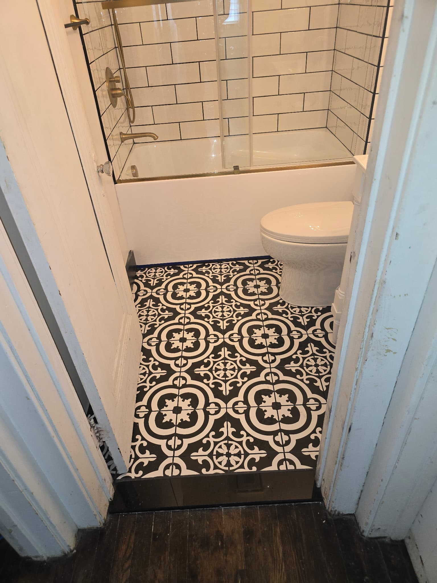 Encaustic-Tile Bathroom by 8 Is Enough Construction in Lorain County OH