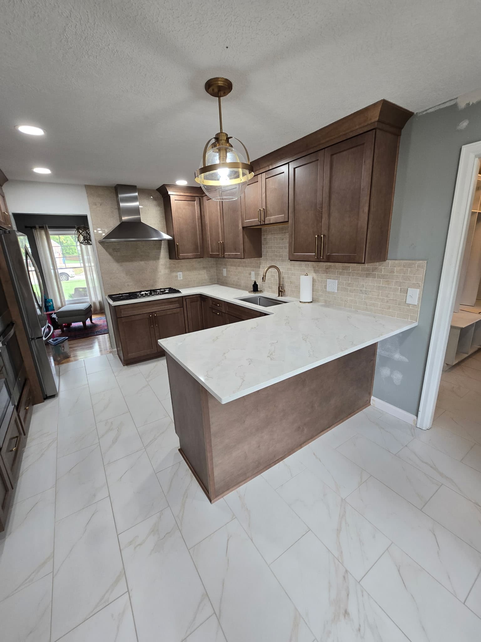 Walnut Shaker Kitchen by 8 Is Enough Construction in Lorain County OH